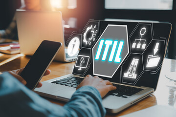 itil, information technology infrastructure library concept, person working on laptop computer with 