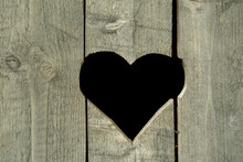 Heart Shape Craved Out In Grey Wood Boards