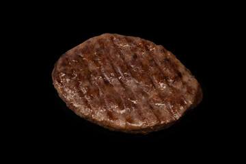 Wall Mural - Cutlet with minced beef isolated on  black background.