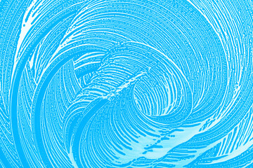 Wall Mural - soap foam circle on window glass, blue background