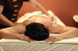 © ME Image - Relaxation Asian man customer get service massage with masseur in beauty spa centre. Body care.