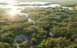 Visit Danube Delta by boat. Beautiful aerial landscape photo of this nature landmark in Romania.