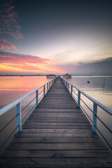 Wall Mural - Wooden jetty on the sea at beautiful sunset, Indonesia