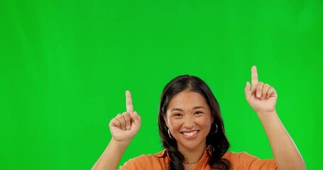 Canvas Print - Happy asian woman, pointing and marketing on green screen against studio background. Female person finger point in market advertising, sale discount or deal for notification, alert or news on mockup