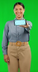 Canvas Print - Phone, green screen and app with a business woman marketing on a blank screen. Portrait, website and chromakey with tracking markers on a mobile display for advertising a product logo in studio