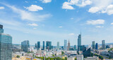 Fototapeta Miasto - Aerial panorama of Warsaw, Poland over the Vistual river and City center in a distance. Downtown skyscrapers cityscape. Business