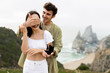 © Prostock-studio - Coastal love story. Loving man making romantic proposal to her girlfriend on the seashore, copy space