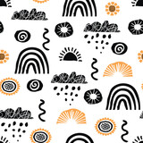 Fototapeta Boho - Free hand abstract shapes seamless pattern.Sun, clouds, decorative flowers, dots and arches.Graphic elements black yellow color on white background.Vector texture for printing on fabric and paper.
