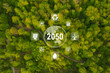 Net Zero 2050 Carbon Neutral and Net Zero Concept natural environment A climate-neutral long-term strategy greenhouse gas emissions targets A cloud of mist in the green Net Zero figure.