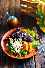 Canvas Print - Beet with goat cheese and nuts. Top view