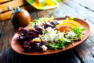 Canvas Print - Beet with goat cheese and nuts. Top view