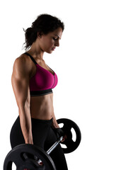 Isolated  woman trains in the gym with weights