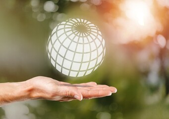 Canvas Print - Protecting concept, hand holds a globe