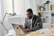 © SHOTPRIME STUDIO - man call job computer african office student american laptop online education freelancer