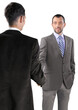 © BillionPhotos.com - Portrait of Two Businessmen Shaking Hands