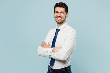 Young smiling happy cheerful successful employee business man corporate lawyer wear classic formal shirt tie work in office look camera isolated on plain pastel light blue background studio portrait.