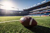 Fototapeta Sport - nfl, ball on ground with american football stadium, wide angle
