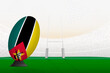Mozambique national team rugby ball on rugby stadium and goal posts, preparing for a penalty or free kick.