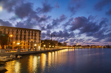 Canvas Print - Panoramic view of Bari, Southern Italy, the region of Puglia seafront at dusk.