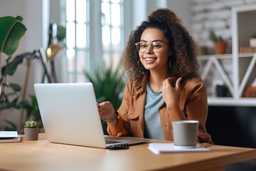 A beautiful girl with a smile on her face communicates with colleagues online, on a laptop. Generative AI