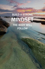 Wall Mural - Seascape sunrise with life inspirational quotes - build a strong mindset, the body will follow