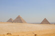 Panoramic Landscape view of Giza pyramids on a bright day