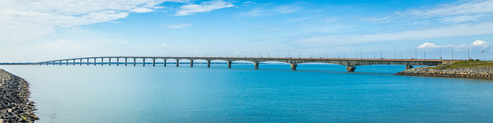 Wall Mural - Panoramic view of the Ile de Ré bridge seen from La Rochelle shore on a sunny day in Charente-Maritime, France