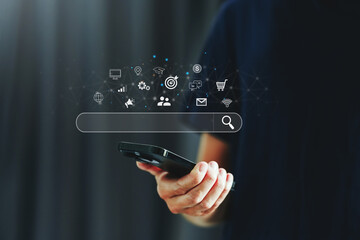 Businessman using a Smathphone for analysis SEO Search Engine Optimization Marketing Ranking Traffic Website Internet Business Technology Concept..