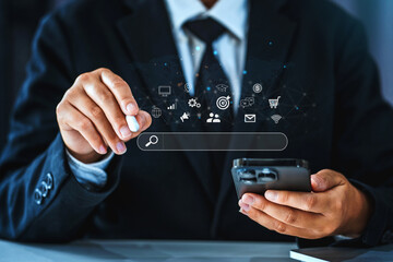 Businessman using a Smathphone for analysis SEO Search Engine Optimization Marketing Ranking Traffic Website Internet Business Technology Concept..