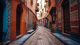 Fototapeta Uliczki - Street view of a Moroccan alley with colorful houses. Generative AI