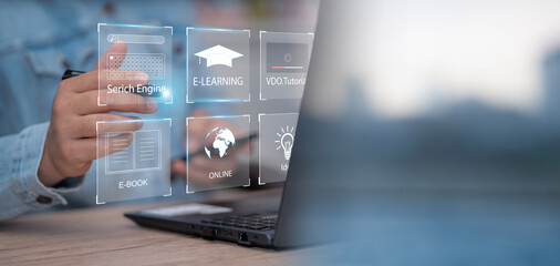 Fototapete - Concept of Online education. man use Online education training and e-learning webinar on internet for personal development and professional qualifications. Digital courses to develop new skills.