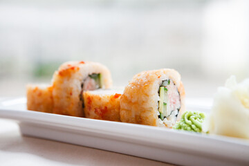 Wall Mural - Flying fish roe maki with wasabi and ginger