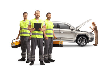 Sticker - Team of road assistance workers with reflective vests standing in front of a woman with a broken down SUV