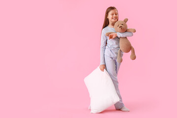 Sticker - Little girl with pillow and toy on pink background