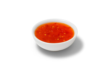 Canvas Print - Chilli sauce in a gravy boat. White background