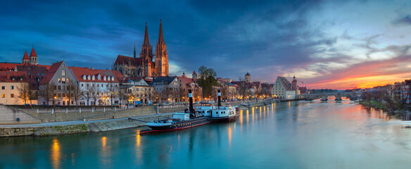 Wall Mural - Panoramic cityscape image of Regensburg, Germany during spring sunset.