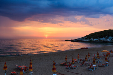 Wall Mural - Summer evening sunset Spiaggia di Sfinale Adriatic Sea beach (Vieste region, Gargano peninsula in Puglia, Italy)