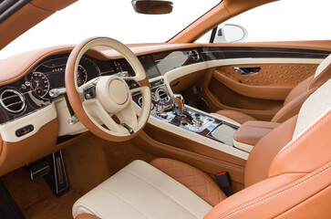 photo of a luxury car interior, auto interior, control buttons, molding, acoustic system and control system