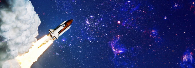Wall Mural - shuttle launch in the clouds to outer space. dark space with stars on background.spaceship flight. e