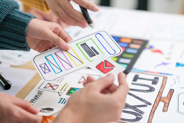 cropped shot of creative web developers are planning application process development prototype wiref