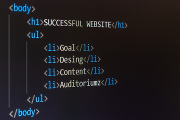 theses of a successful site written on the monitor in the form of code