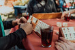 © .shock - A group of men drink traditional Turkish tea and play a Turkish game called Okey