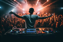 A Dj MixinPhoto Of A DJ Performing A Live Set In Front Of An Enthusiastic Audience