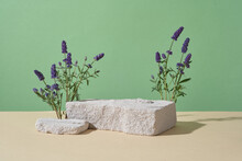Broken Stone Podiums Featured Over Pastel Green Background With Lavender Flowers. Concept Scene Stage Showcase For Product That Extracted From Lavender (Lavandula)