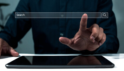 Wall Mural - search engine optimization concept, human hand technology search information using tablet to search 