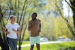 © zinkevych - Mature couple jogging in the park in the morning