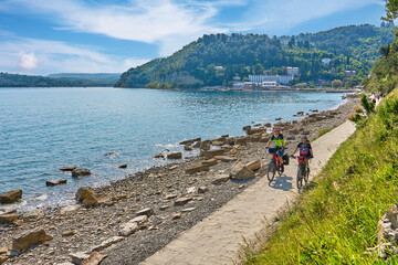 Wall Mural - active senior couple on a mountain bike tour at Capodistria, Slovenian Mediterranen cost near Izola and Koper