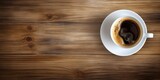 Fototapeta Mapy - Minimalistic Workspace. White Coffee Cup on Top view Wooden Table