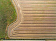 © Austockphoto - Aerial view of harvester lines and patterns in a rural paddock