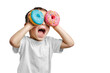Happy cute boy is having fun played with donuts on png background. Bright photo of a child.